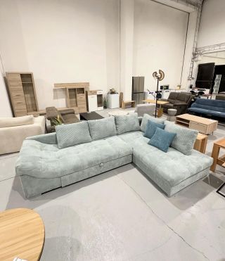 Světle modrá rozkládací sedací souprava Moss Materiál: 100 % polyester, MDF Rozměry: 298 x 84 x 202 Ložná plocha po...